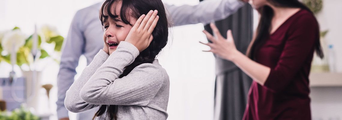Father beating mother and crying child