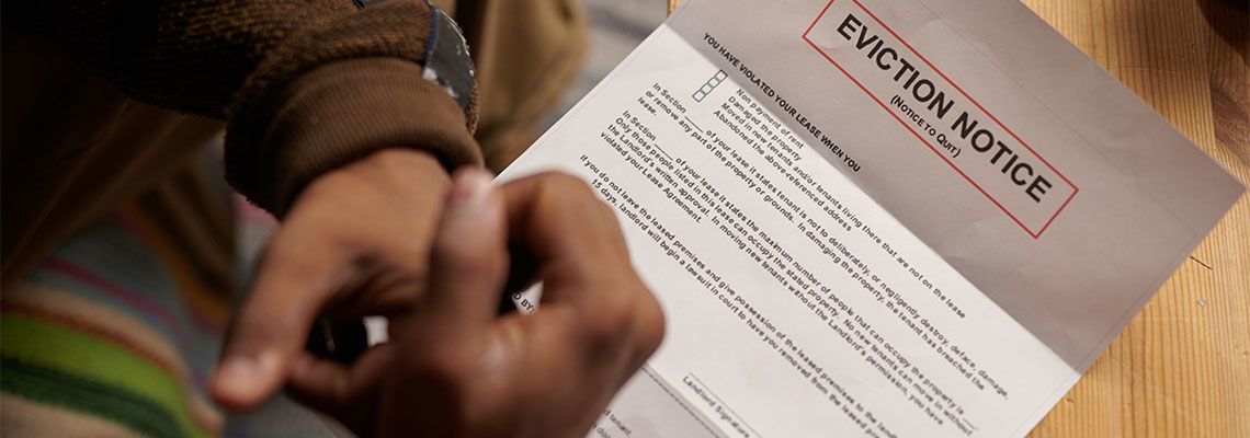 Man reading eviction notice