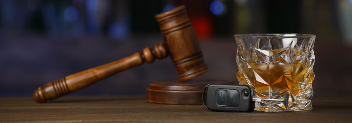 Car Keys, Gavel and Glass of Alcohol