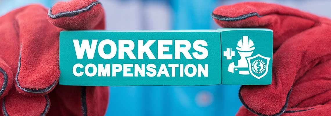 Block with word workers compensation carried by worker