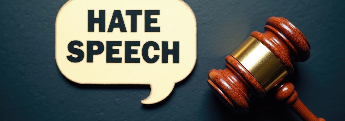 Speech bubble featuring the term hate speech alongside a gavel