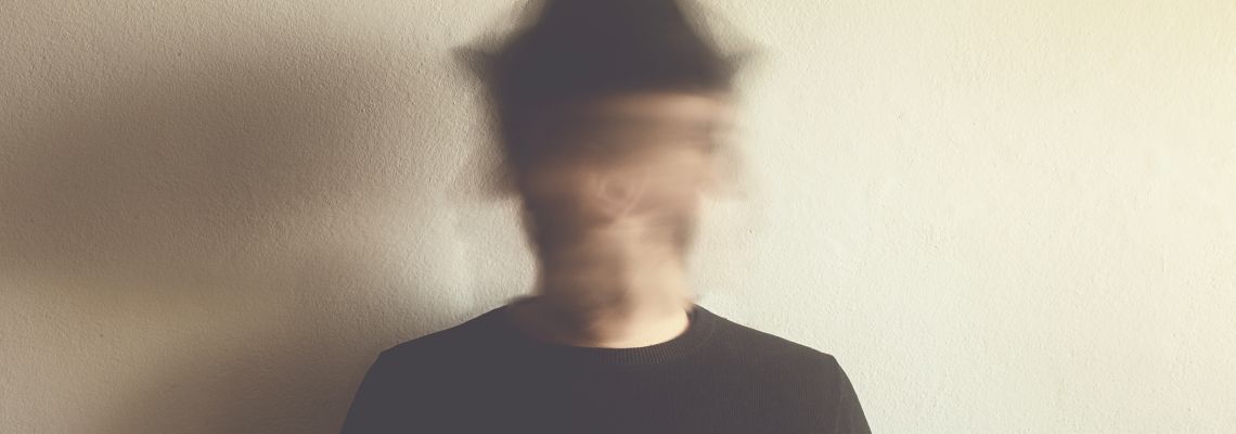 Man with blurred head