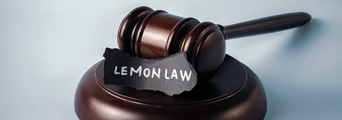 Wooden Gavel and Sound Block with 'Lemon Law' Text
