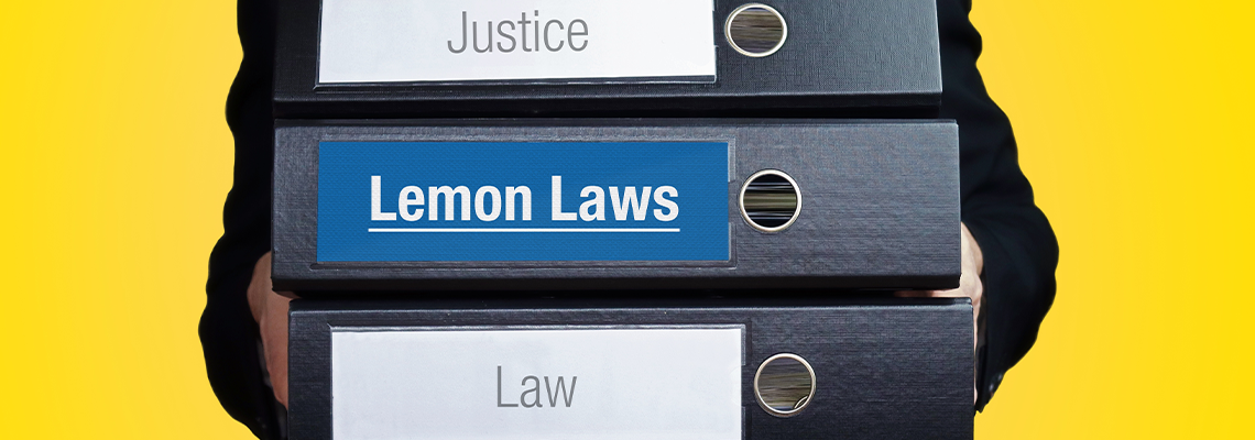 Lemon Laws. Lawyer (man) carries a stack of folders