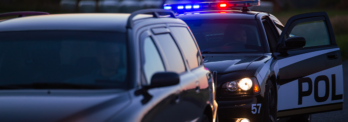 Highway Traffic Patrol Car Pulls over Vehicle on the Road