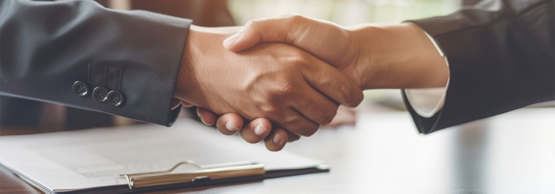 Businessmen shaking hand after agreement
