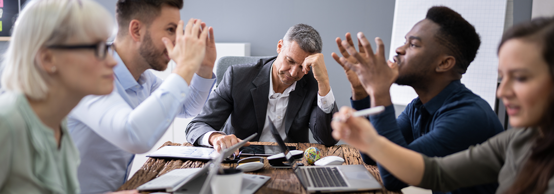 Business People Arguing In Meeting at the Office