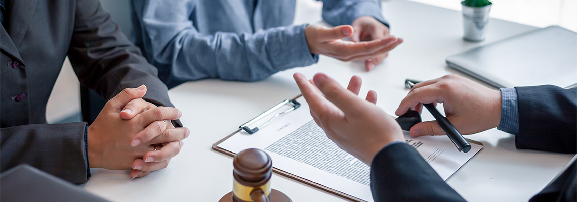 Clients and Lawyer Discuss the Bankruptcy Document