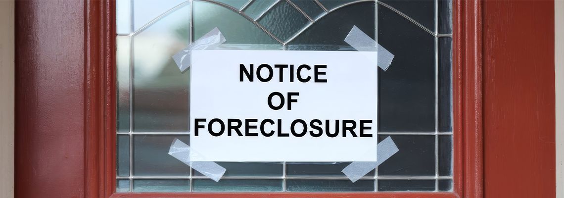 House door with foreclosure notice
