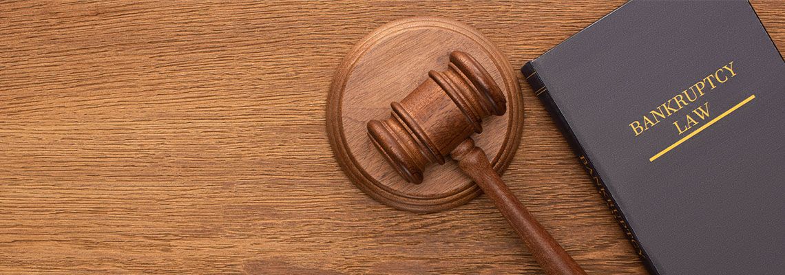 Bankruptcy law book and gavel