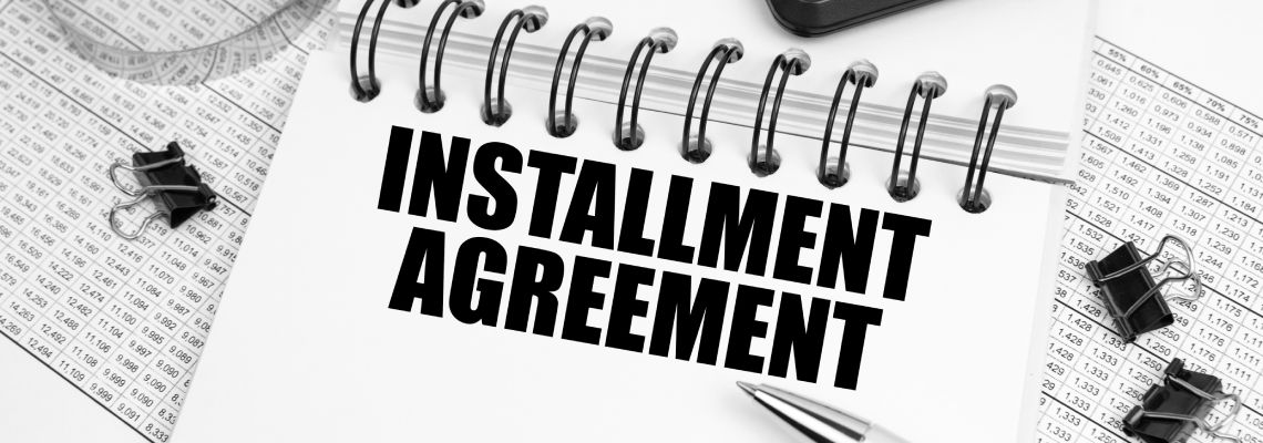 Notebook with the inscription Installment Agreement