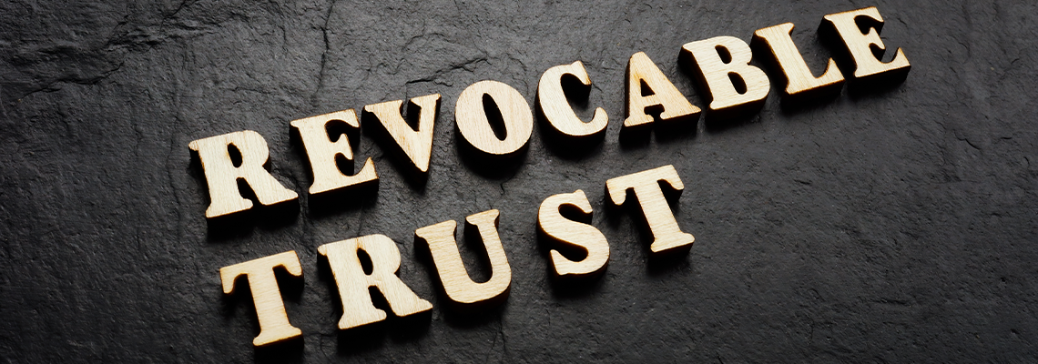 Revocable trust words on the dark background