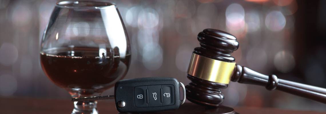 Glass of Alcohol, Car Keys and Gavel