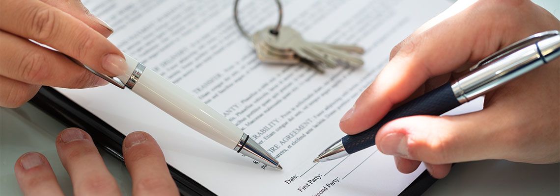 Person Signing Lease Contract