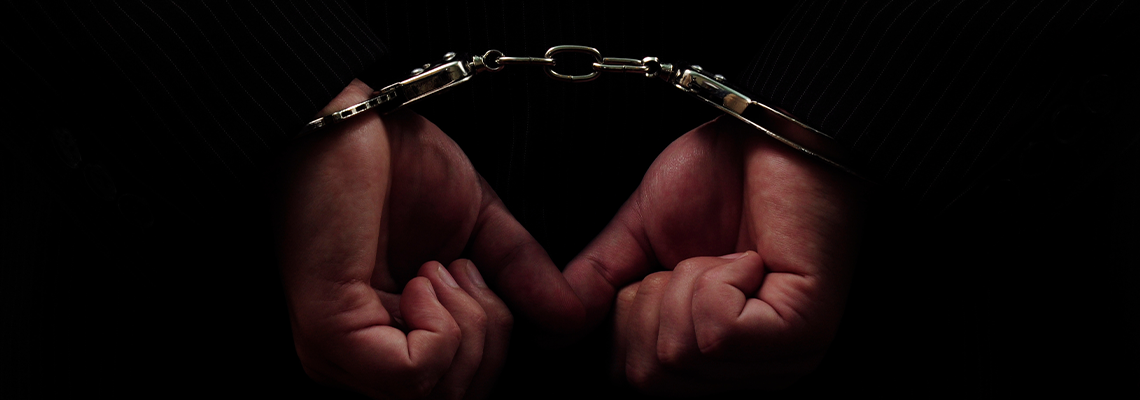 Hands in Handcuffs