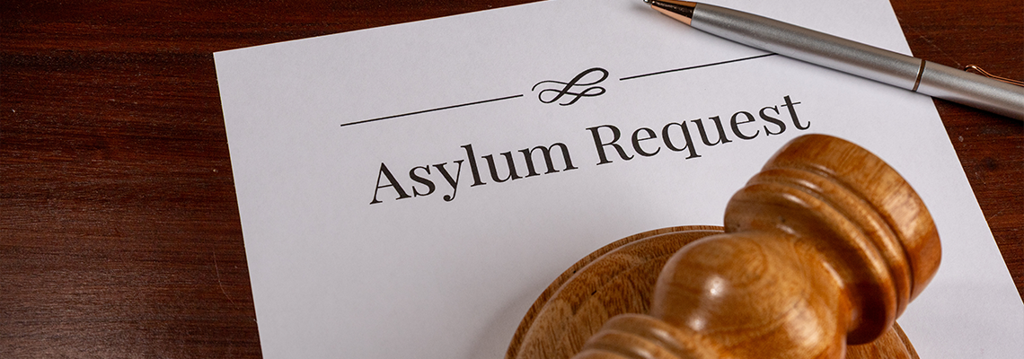 Asylum Request Form on Wooden Desk with Gavel