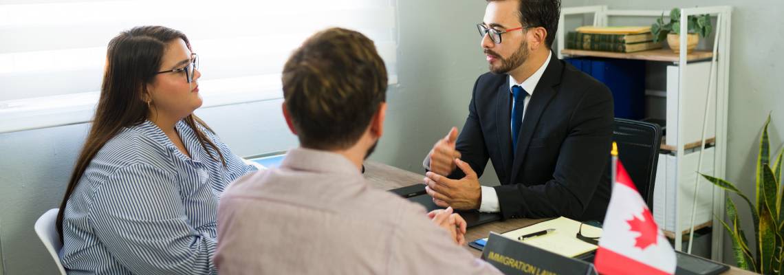 Couples consulting with an Immigration attorney