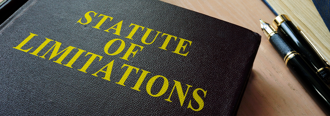 Statute of limitations (SOL) on a court desk with pen