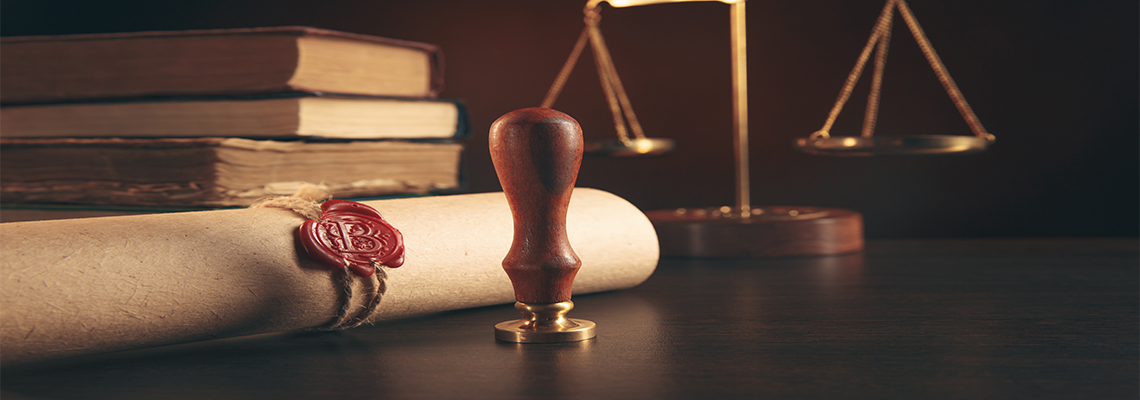 Notary's public pen and stamp on testament and last will. Notary public tools