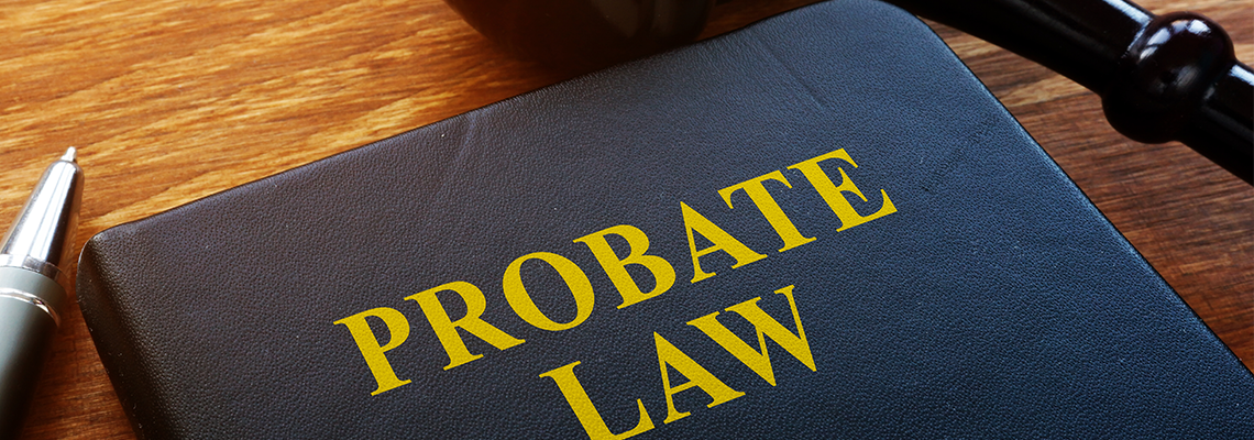 Probate Law book and wooden gavel in the court.