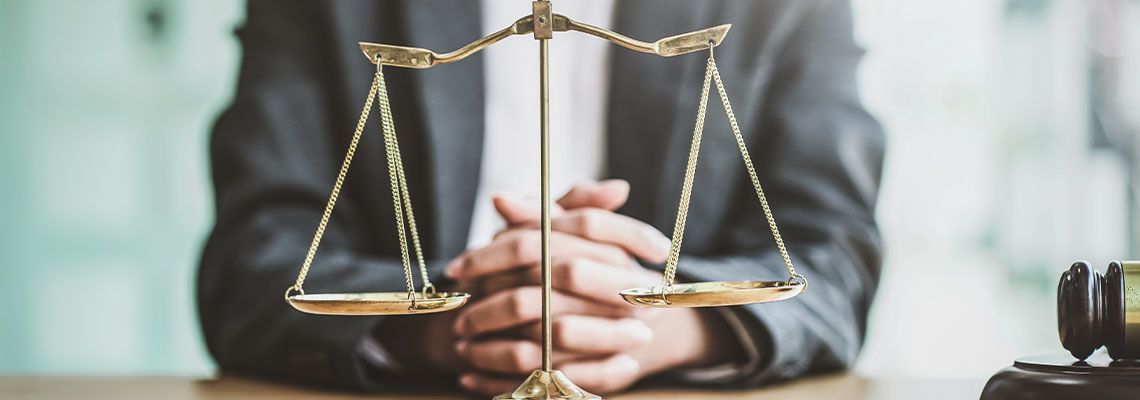 Close up golden scales with blurry lawyer as background