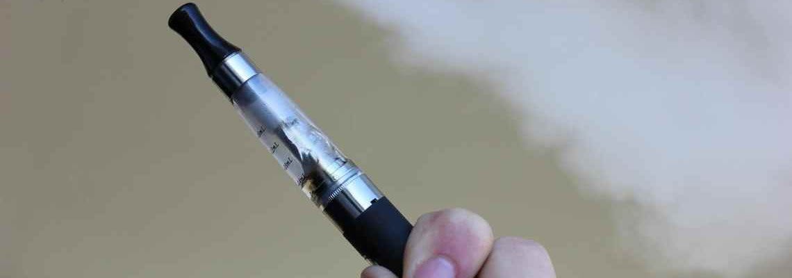 Hand holding an e-cigarette