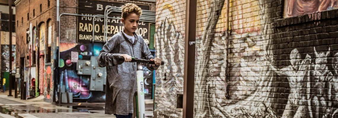 Boy on an electric scooter