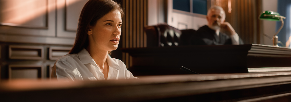 Court of Law and Justice Trial Stand: Portrait of Beautiful Female Victim Giving Heartfelt Testimony