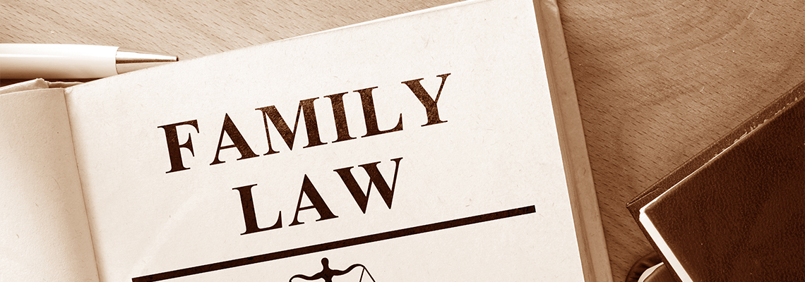 Book with Words Family Law and Glasses