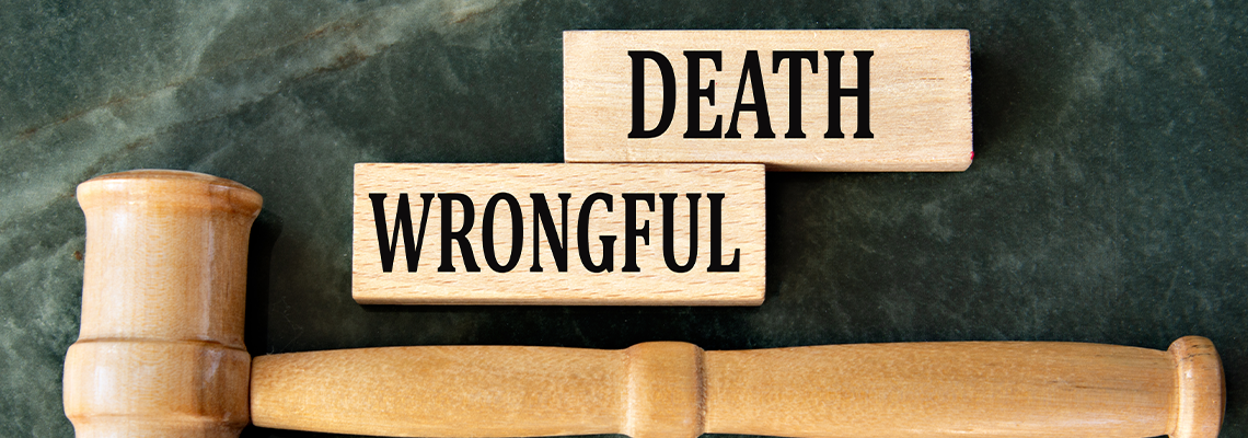WRONGFUL DEATH - words on wooden blocks with a judge's gavel