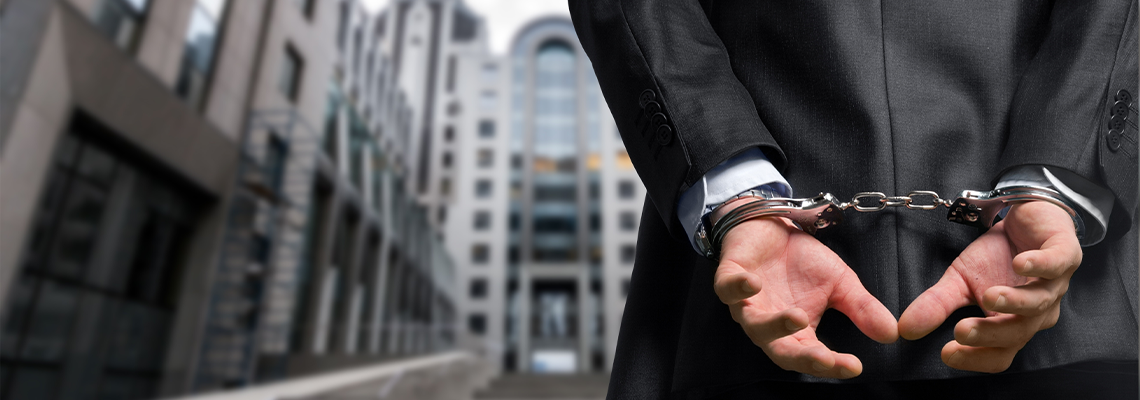 Person Arrested of White Collar Crime