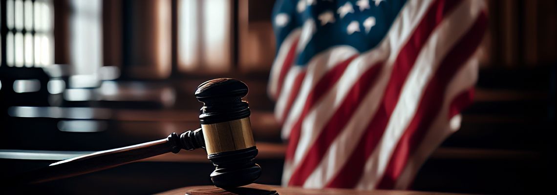 American flag in courtroom with Judge hammer