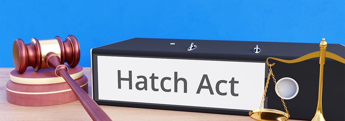 Hatch Act file folder with gavel and scale of justice