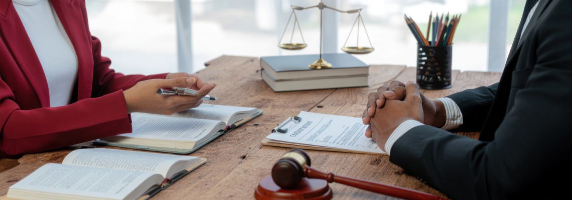 Man, consulting with attorney