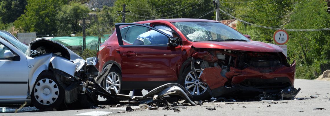 Damaged Car after crash in road