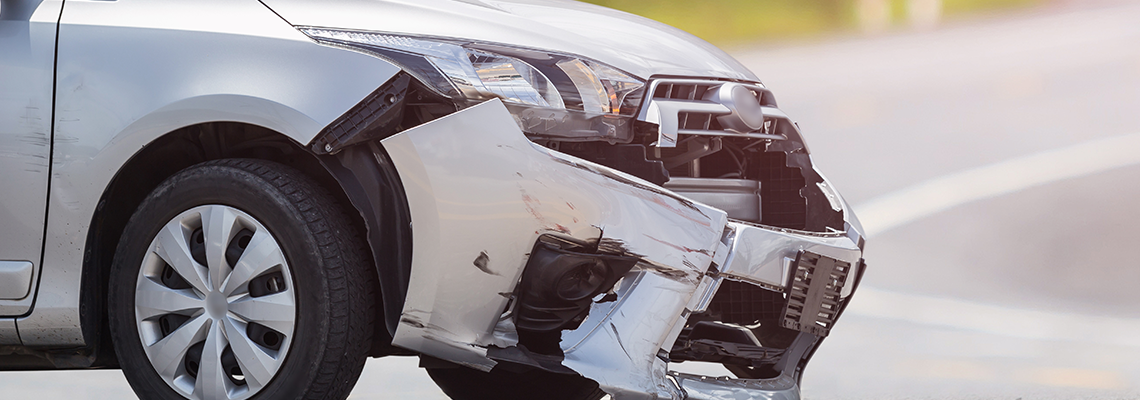 Silver car get damaged by crash accident