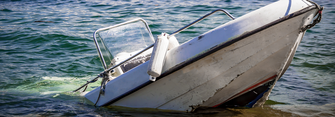 Sunken inflatable boat on river