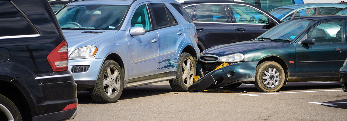 Collisions in Parking Lots and Parking Garages