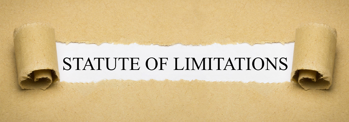 Statute of limitations written on torned paper