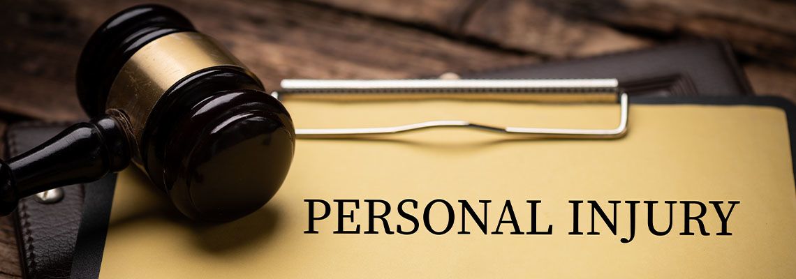 Personal Injury Law text on Document and gavel