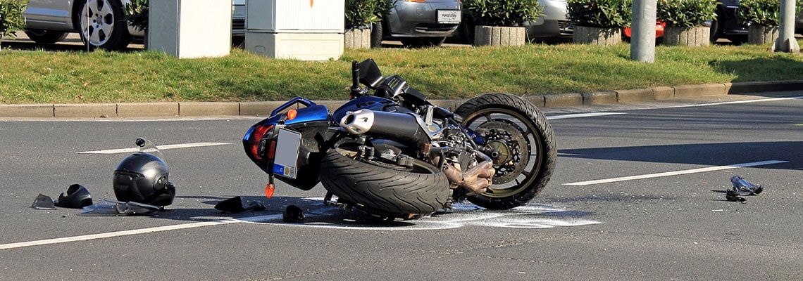 Crashed motorcycle in road