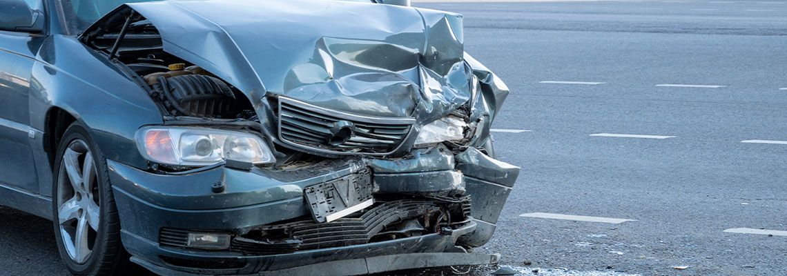 Damaged car after crash in accident