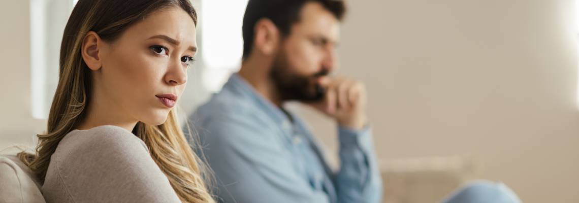 Unhappy couples at home