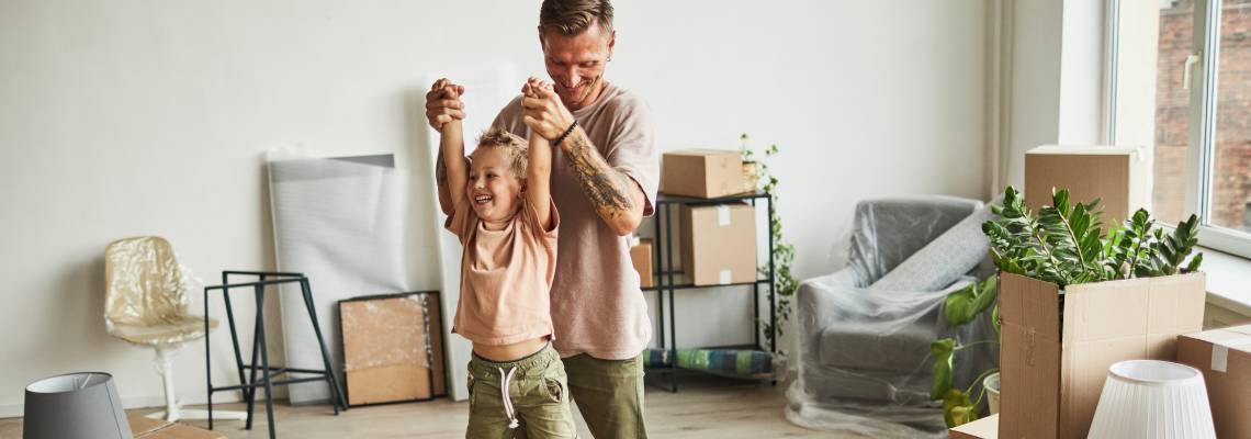 Child with her Dad in new home