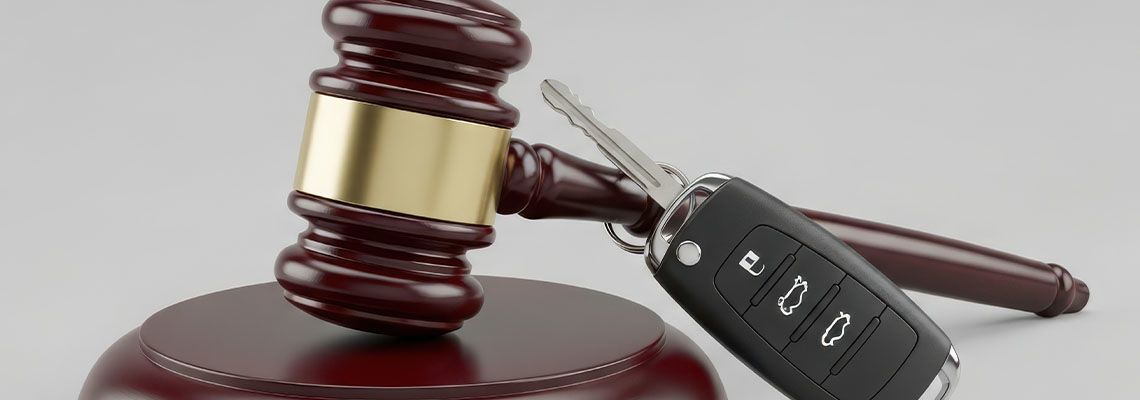 Gavel and Car Keys on table