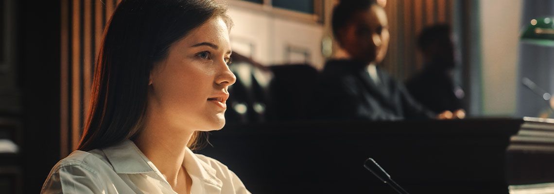 Witness testifying in courtroom