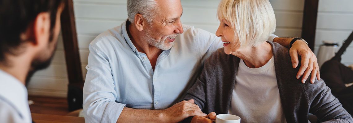 Senior couples exploring estate option with help of professional
