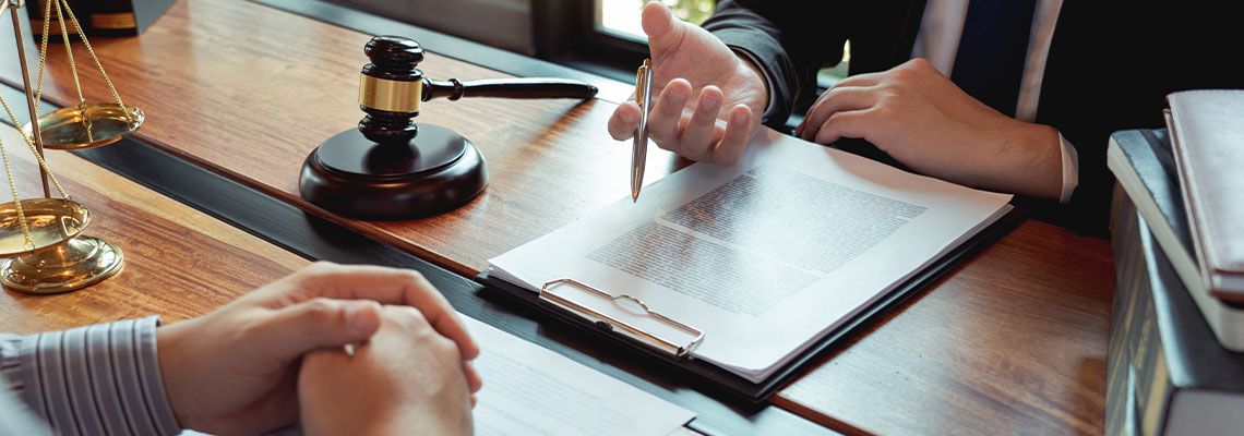 Attorney providing legal consultation to client