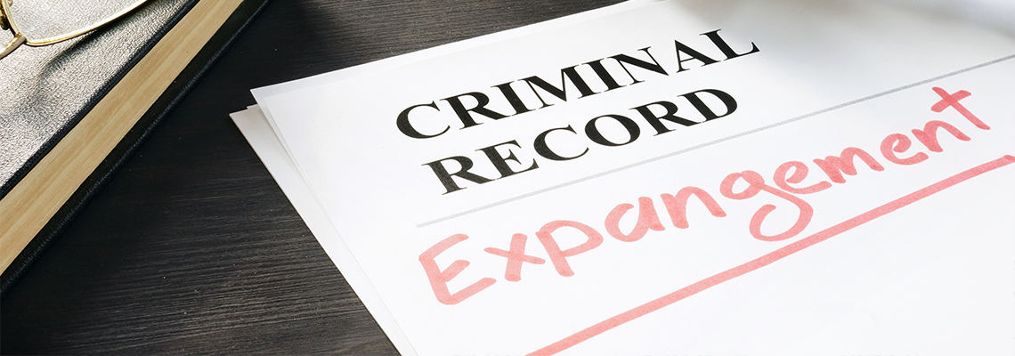 Criminal Record Expungement written out on paper