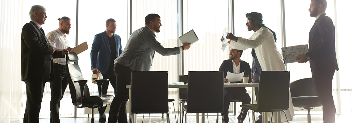 Business partners arguing about bad contract